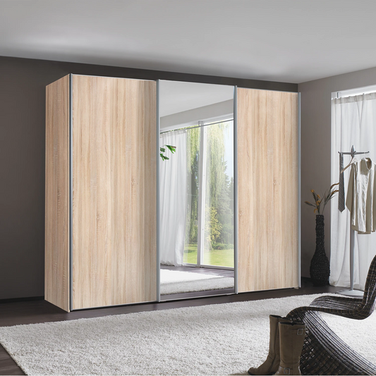 Wiemann Oxford 3 Door Mirror Sliding Wardrobe in Rustic Oak styled in a modern bedroom