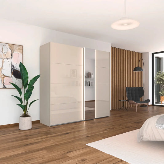 Rauch Champagne Perth Sliding Door Wardrobe with Mirror - Styled in a Bedroom