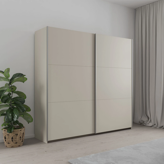 Rauch Aurelia Champagne Sliding Door Wardrobe styled in a beautiful room