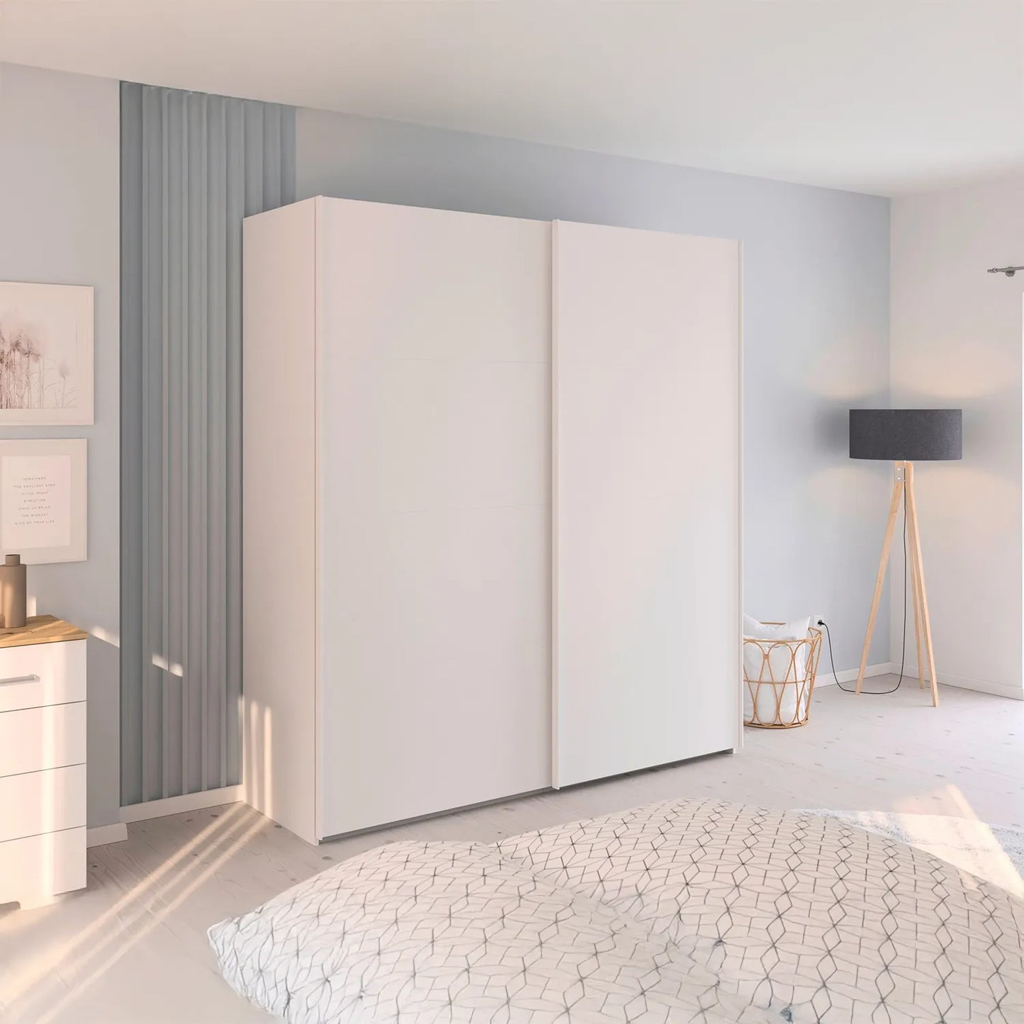 Modern bedroom with a large white wardrobe, light gray walls, and minimal decor.