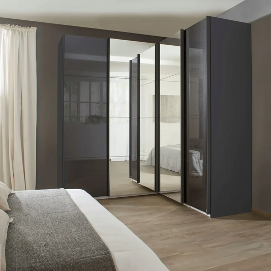 Rauch Lema 4 Door Sliding Corner Wardrobe - High Gloss Effect Grey - Styled in a Bedroom