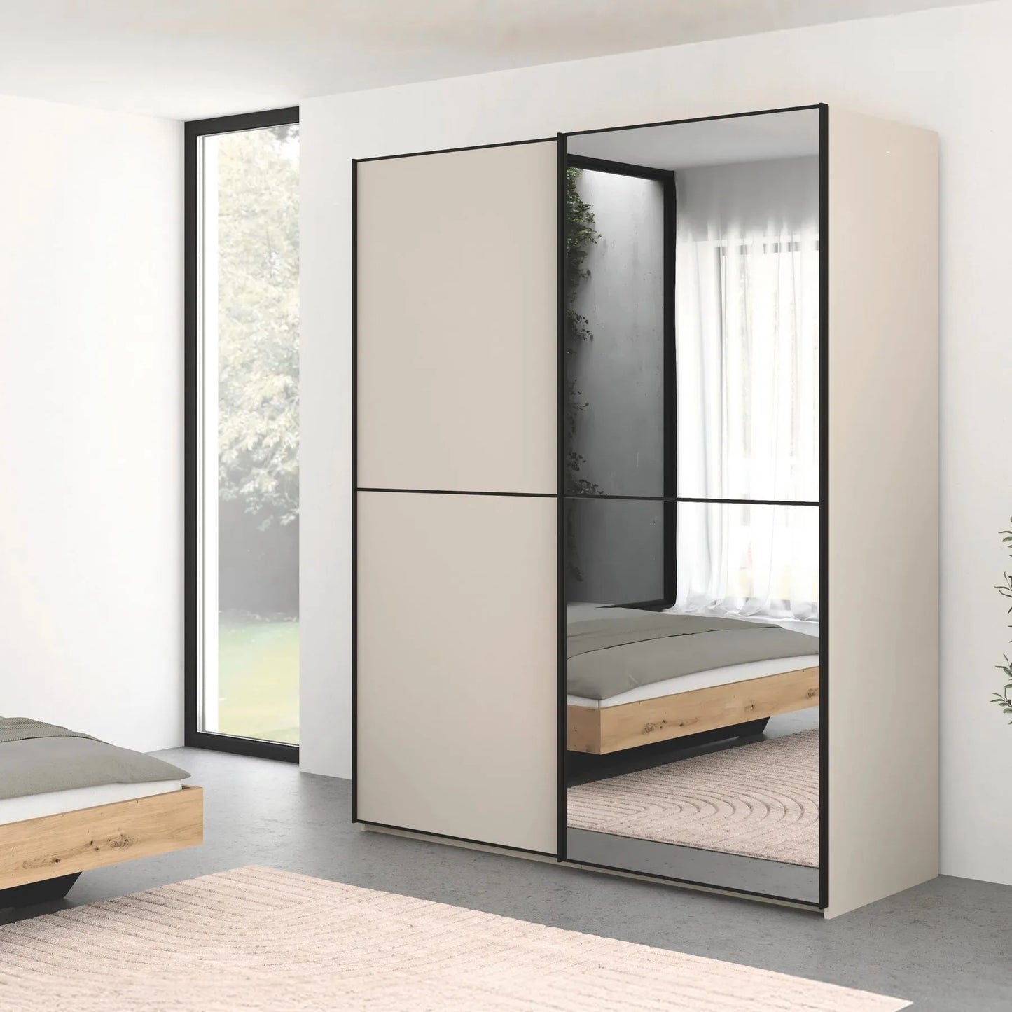 Rauch Black Supreme Duo Champagne 2 Door Sliding Wardrobe with Mirror with Black Trims and Door Handles Room Shot