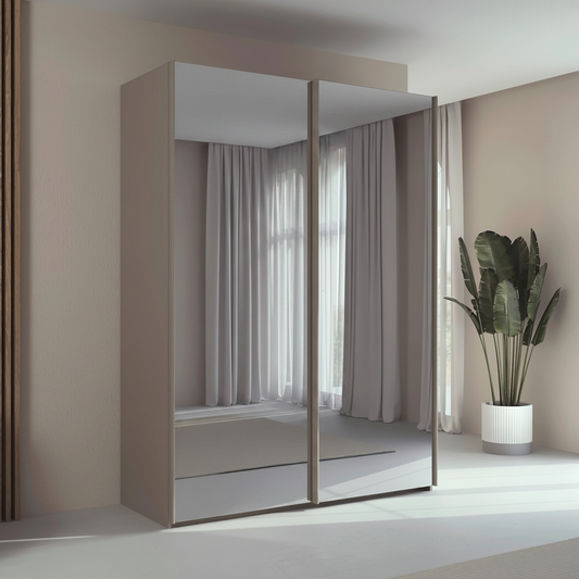 Rauch Taro 2 Door full mirror sliding wardrobe with Fango Carcase double mirrored doors styled in a modern bedroom
