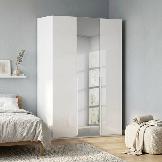 Rauch Haven 3 Door Hinged Wardrobe with 2 Glass Doors and 1 Mirror Door - Styled in a Bedroom