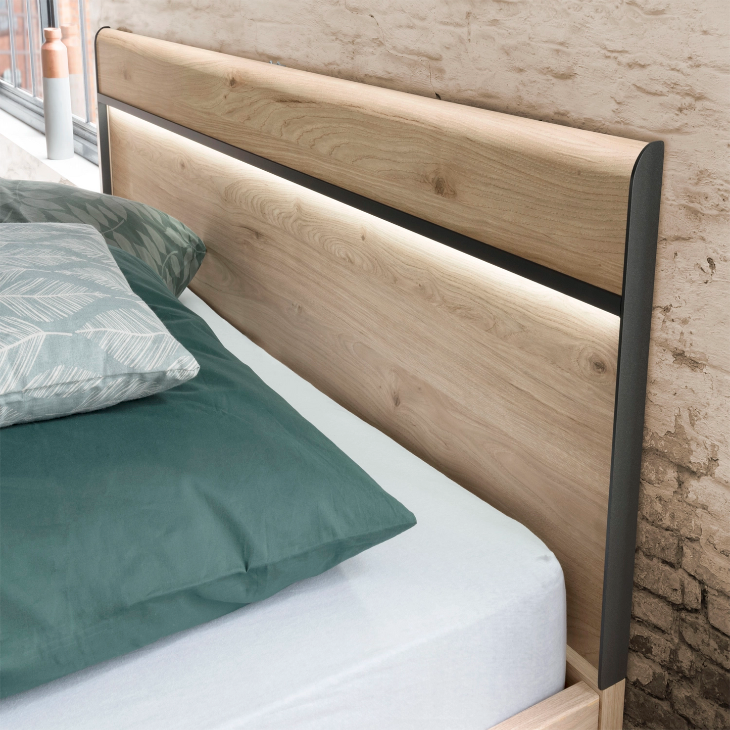 Johnson Futon Bed with Wooden Headboard and Slate Angled Feet - Closeup View