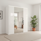 Wiemann Saka 200cm Bi-Fold Wardrobe With 2 Glass Doors & 2 Mirror Doors in White Glass Styled in a bedroom
