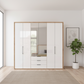 White Oak Wiemann Saka wardrobe with mirrored centre doors and drawer storage
