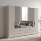 Amelia 250cm 6 Door Bifold Combi Wardrobe with 4 Mirror Doors, 2 Glass Doors and 6 Glass Drawers - Pebble Grey Styled in a Bedroom