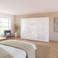Rauch Artemis White and Champagne Glass Front 3 Door Sliding Wardrobe  - Styled in a room