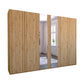 Wooden wardrobe with mirrored doors on a white background by Wiemann