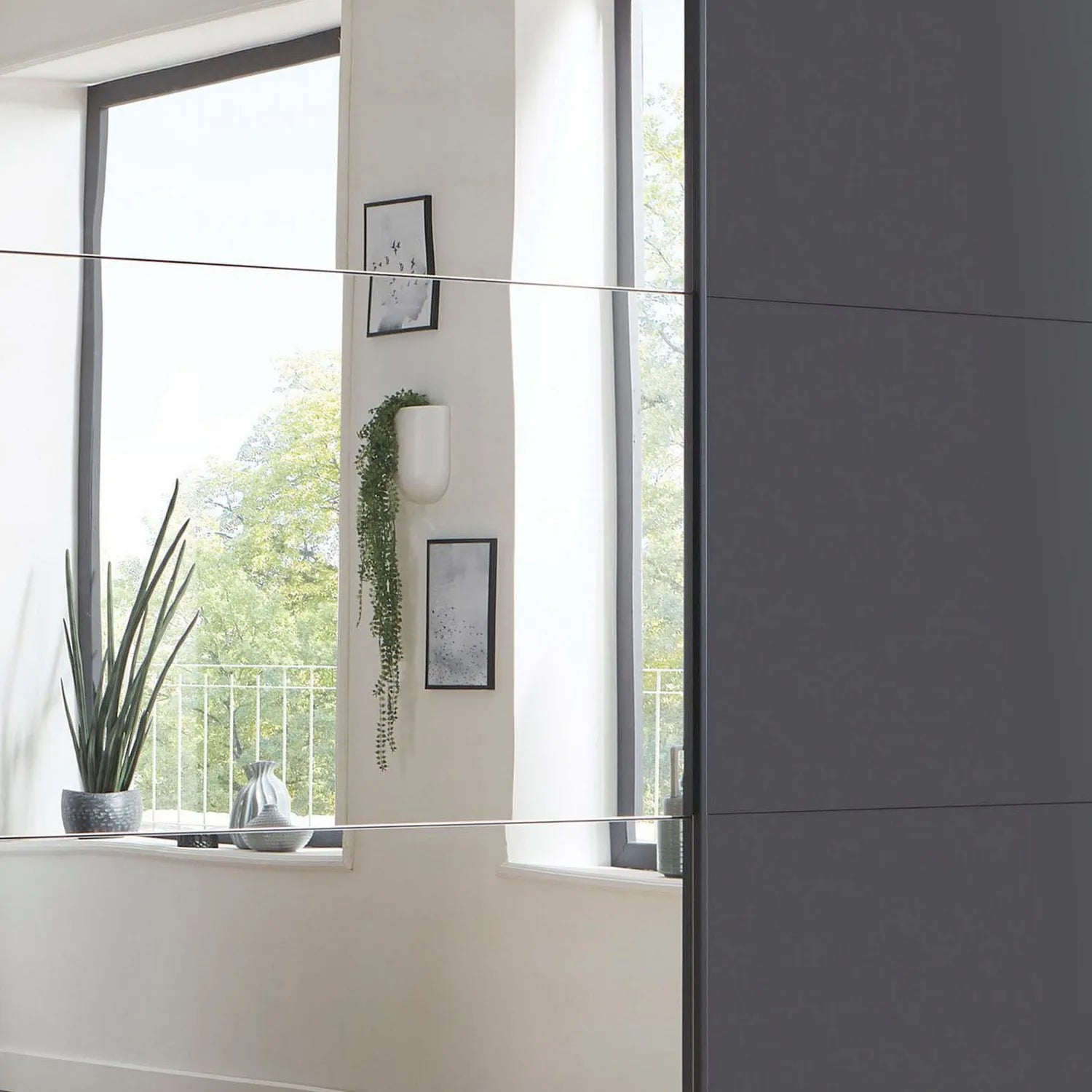 Close up of Corfu Graphite Sliding Door Wardrobe With Mirror by Wiemann