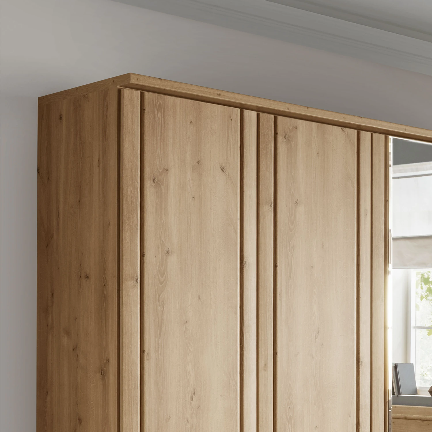 Wooden wardrobe with hinged doors in a room setting