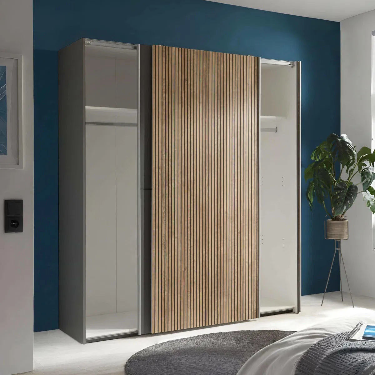 Modern wardrobe with wooden slat design in a bedroom setting
