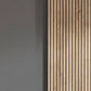 Grey wardrobe with slatted panel design and sliding doors