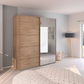Rauch Eve Wooden wardrobe with mirror in a modern bedroom setting
