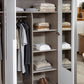 Frans 300cm Glass 6 Door Wardrobe in Silk White Glass - Close view Styled in a Living Room