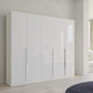 Rauch Glamour 5 Door White High Gloss Wardrobe - W226 CM - Styled in a Bedroom