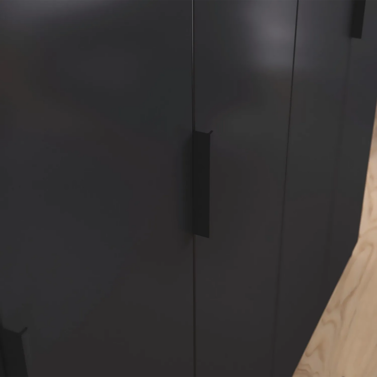 Close-up of a black cabinet with black metal handles