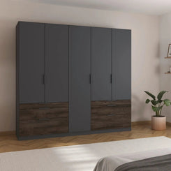 Rauch Large dark gray wardrobe with wooden bottom section in a bedroom setting.
