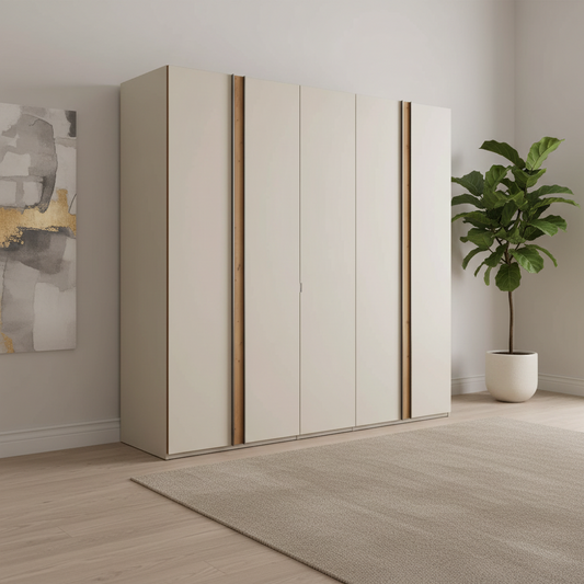 Champagne wardrobe with wooden accents in a room with a plant and abstract art.