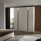 Larisa Champagne & Atlantic Oak Hinged 4 Door Wardrobe with Lights styled in a room