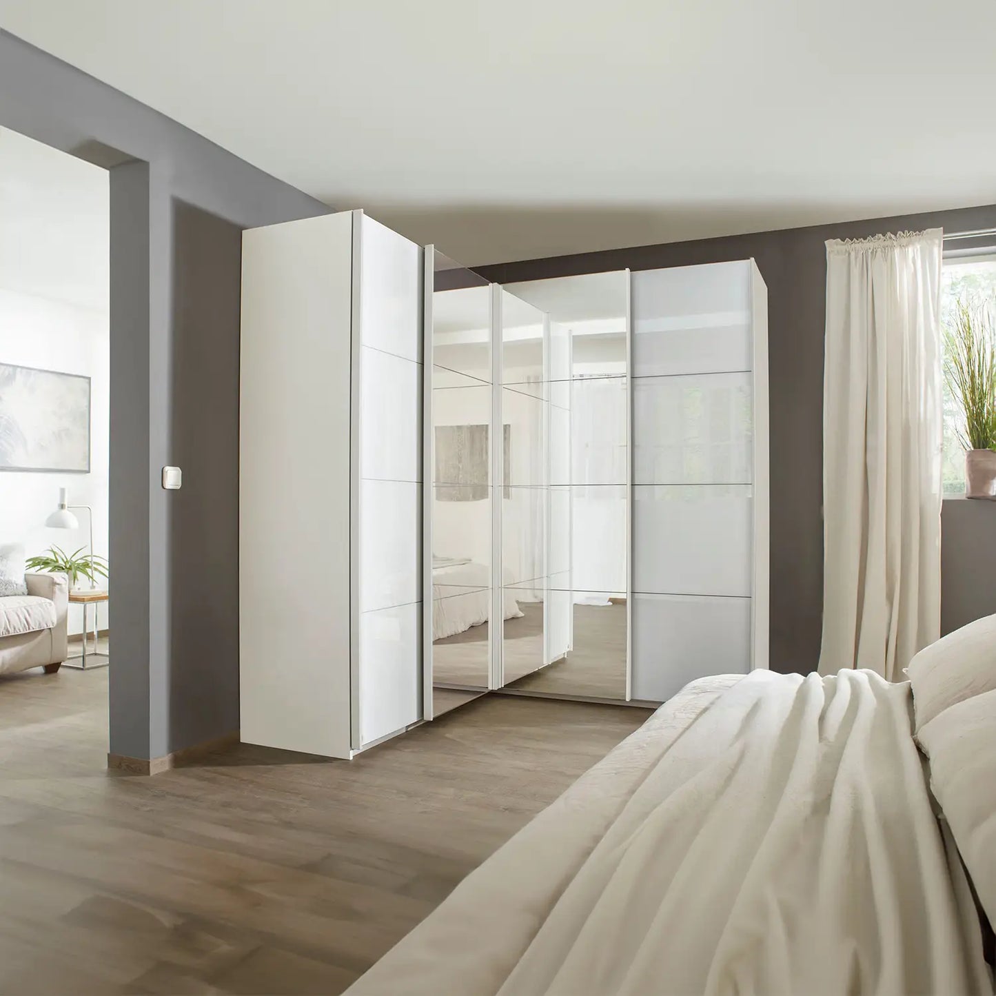 Lema 181cm 4 Door Corner Sliding Wardrobe with 2 Glass Doors and 2 Mirror Doors - Styled in a Bedroom