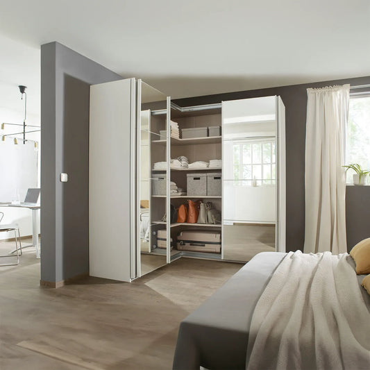 Lema Decor White 4 Door Sliding Corner Wardrobe - Styled in a Bedroom