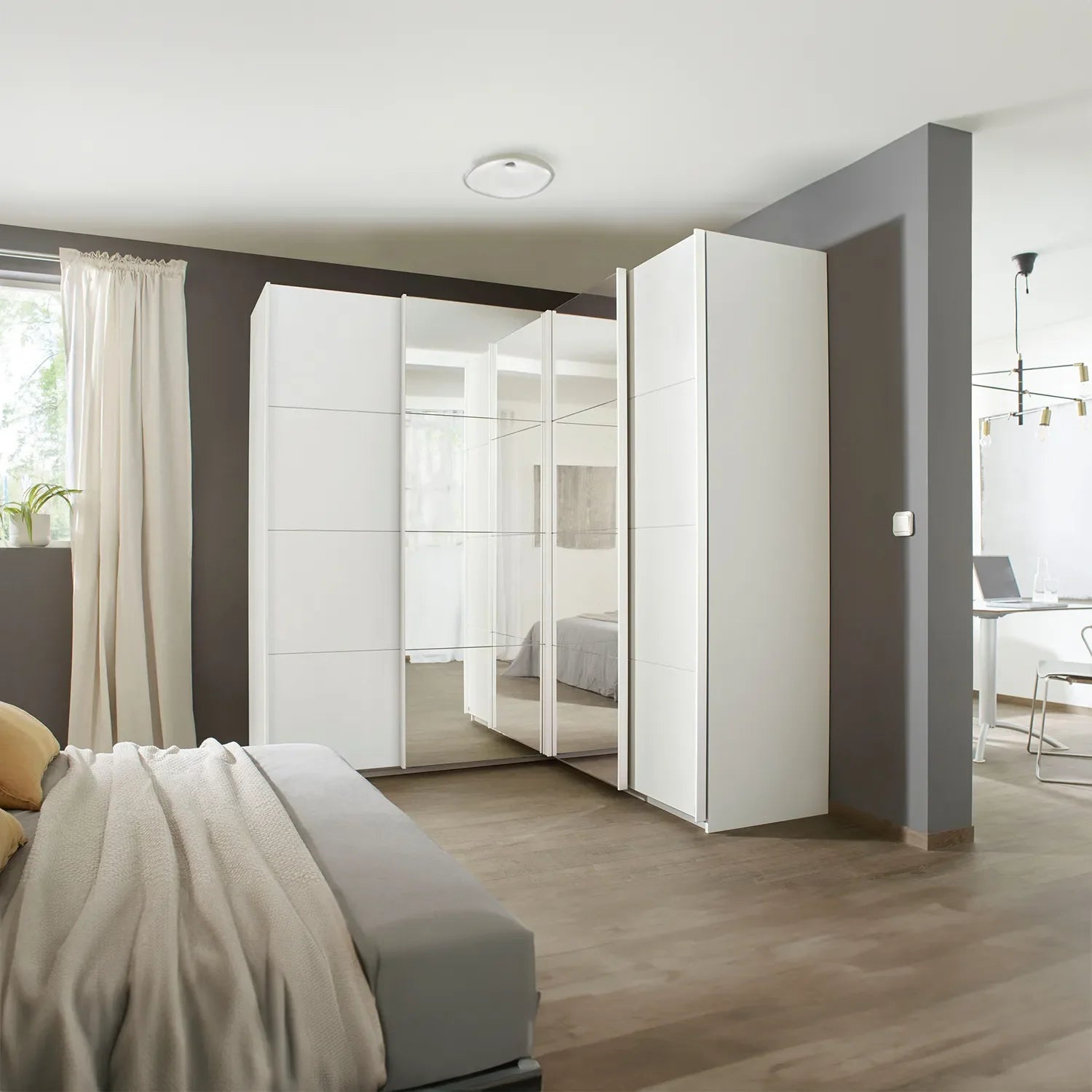 Lema Decor White 4 Door Sliding Corner Wardrobe - Styled in a Bedroom