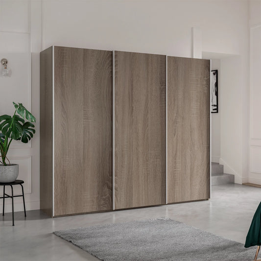 Wiemann Oxford 3 Door Decor Sliding Wardrobe in Dark Rustic Oak styled in a modern bedroom
