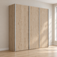 A three-door wardrobe or closet cabinet with light oak wood grain doors and slim silver metal edge trim, shown at a three-quarter angle on a plain white background.