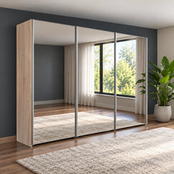 Wiemann Oxford 3 Door Mirror Sliding Wardrobe in Rustic Oak styled in a modern bedroom