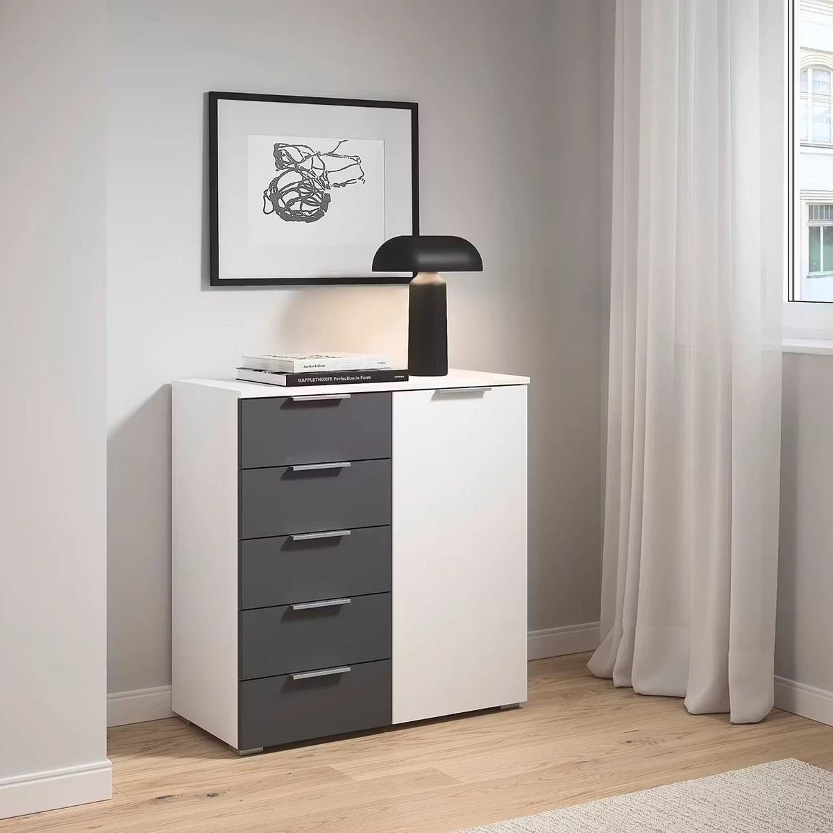 Rauch Monza Chest Of Drawers With 1 Door & 5 Drawers- 80cm in Alpine White & Metallic Grey Drawers styled in a modern bedroom