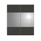 Modern wardrobe with black and grey mirror finish doors on a white background