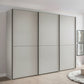 Wiemann Phoenix matt decor Champagne 3 Door Sliding Wardrobe styled in a room 