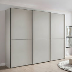 Wiemann Phoenix matt decor Champagne 3 Door Sliding Wardrobe styled in a room 