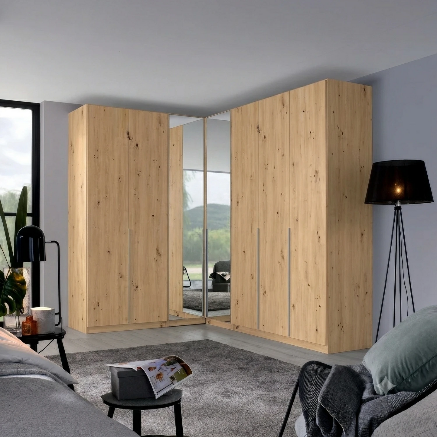 A large corner wardrobe with light natural wood grain doors and mirrored sliding panels, shown in a modern bedroom setting.
