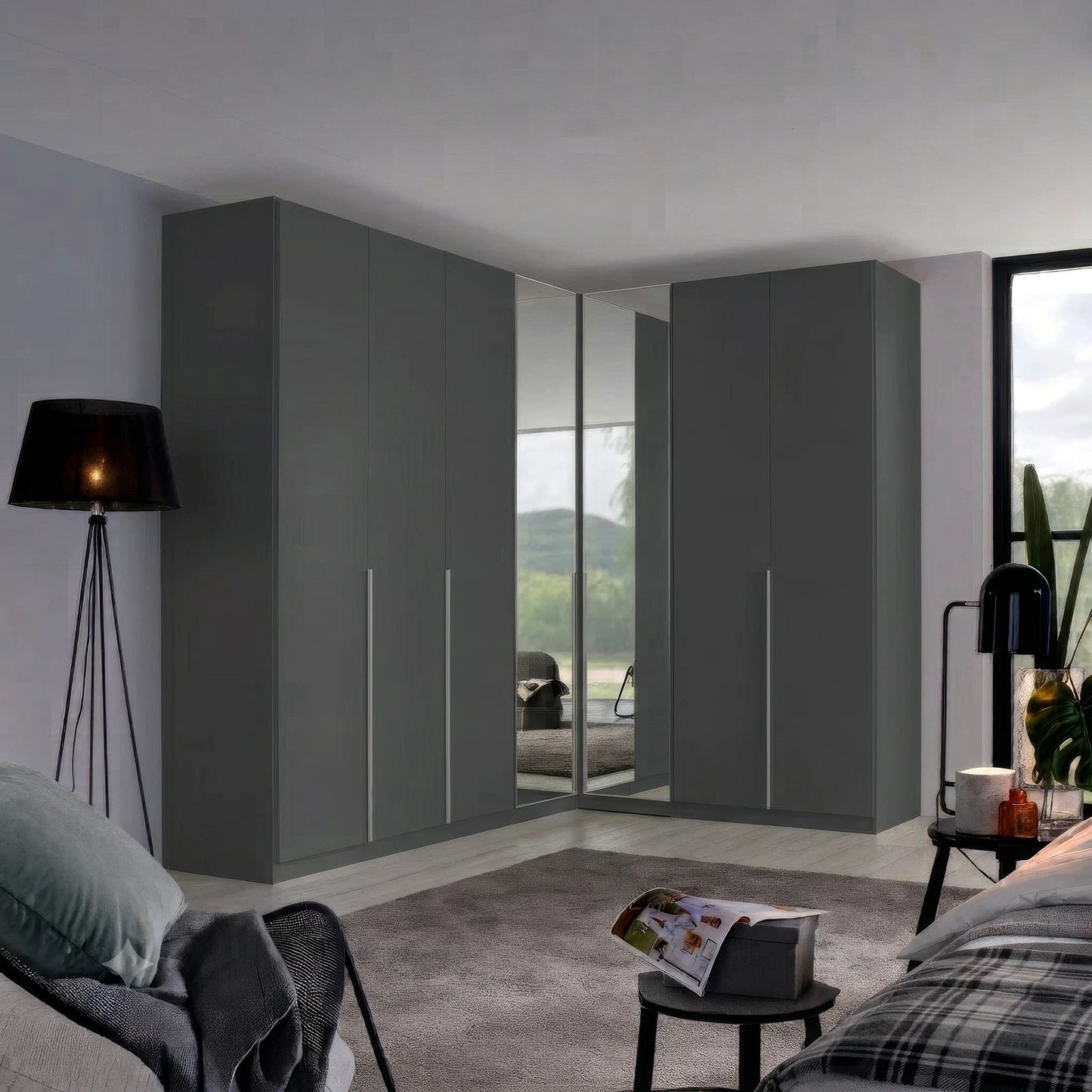 A set of modern dark gray wardrobe doors with integrated vertical mirrors, shown installed in a contemporary bedroom setting.