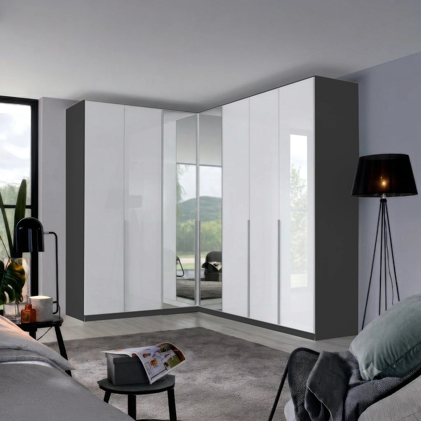 A modern rauch corner wardrobe system with white high-gloss doors and dark gray side panels, installed in a contemporary bedroom setting.