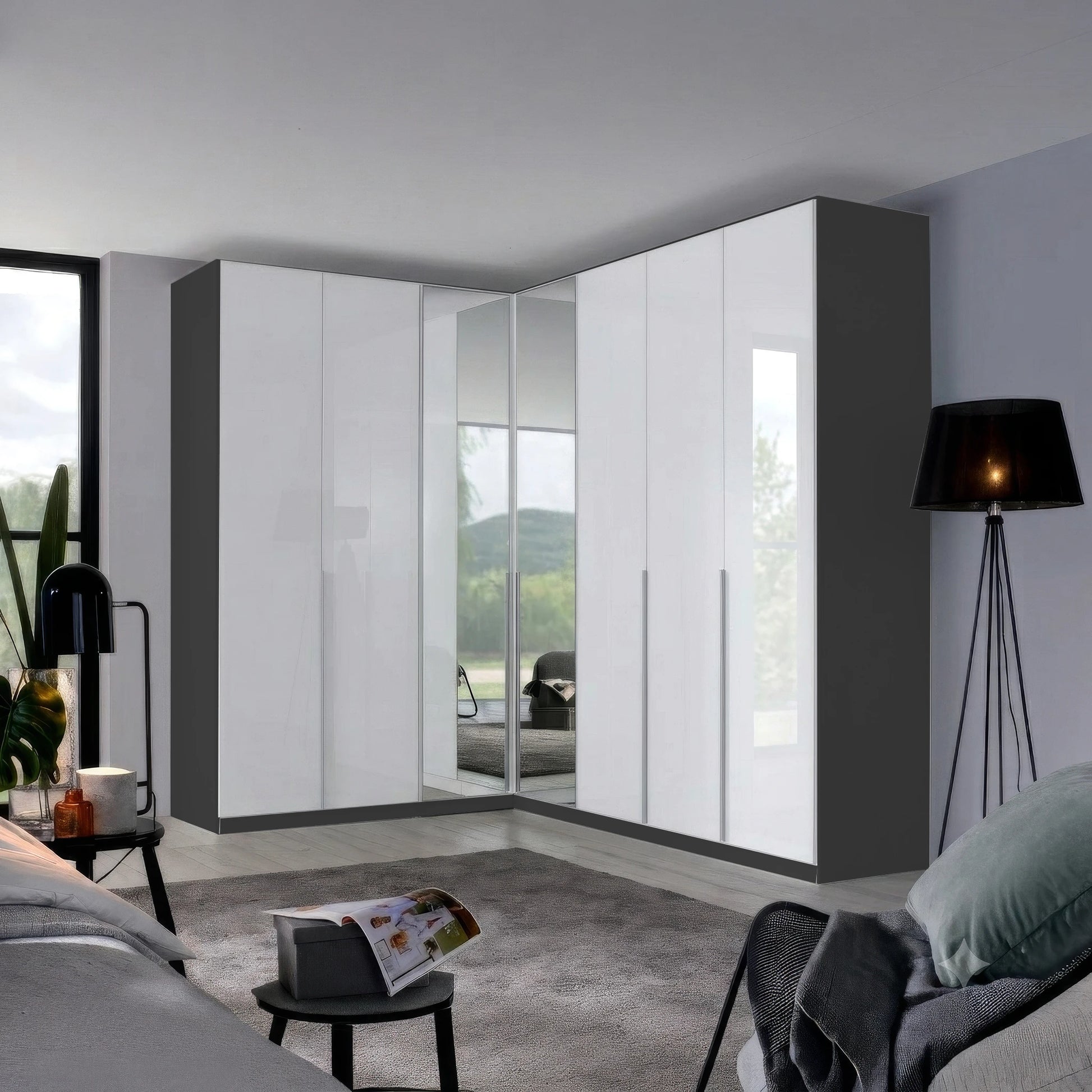 A modern rauch corner wardrobe system with white high-gloss doors and dark gray side panels, installed in a contemporary bedroom setting.