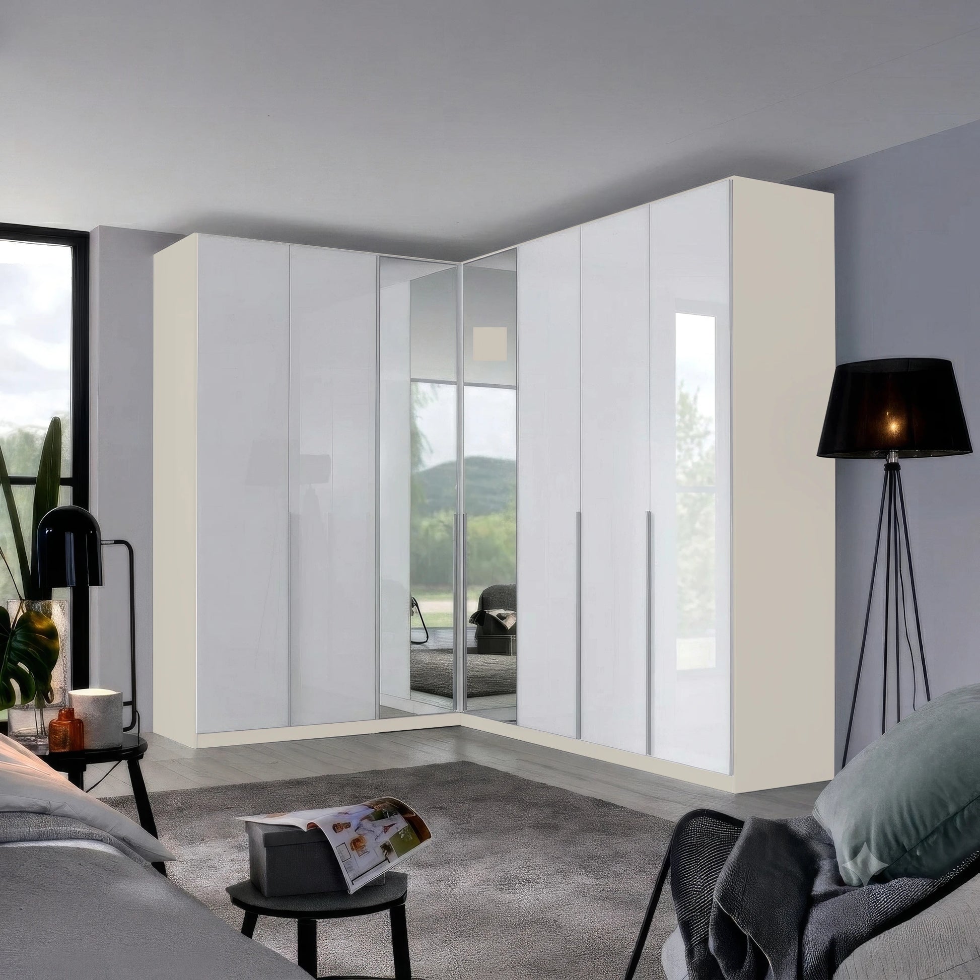 A modern corner wardrobe set with glossy white doors and mirrored Doors in the Middle, shown installed in a contemporary bedroom interior.
