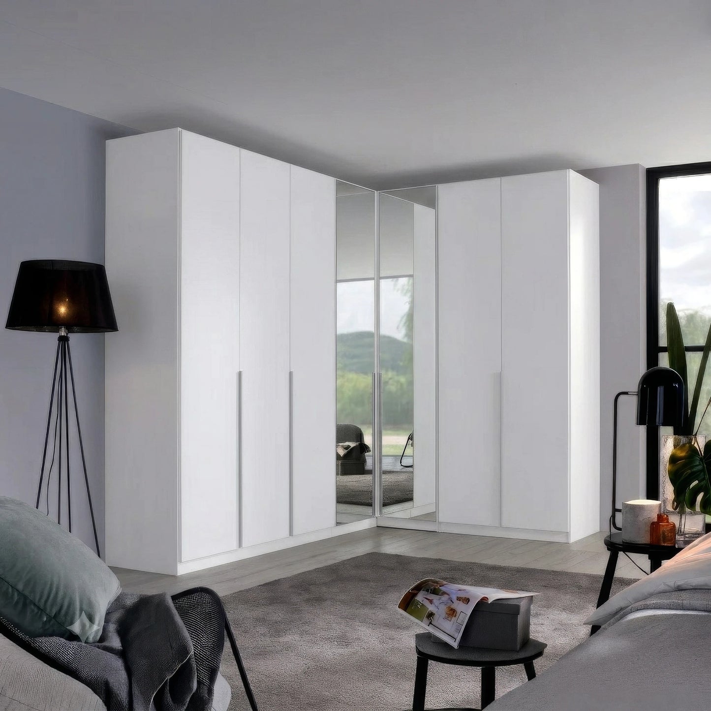 A set of modern corner white wardrobe with two mirrored doors in the center, shown installed in a contemporary bedroom setting.