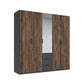 A modern Rauch Fifty five-door wardrobe with a dark brown wood Atlantic Oak grain finish on the doors and drawers, featuring a central mirror and dark gray side panels and drawer fronts, shown on a plain white background.