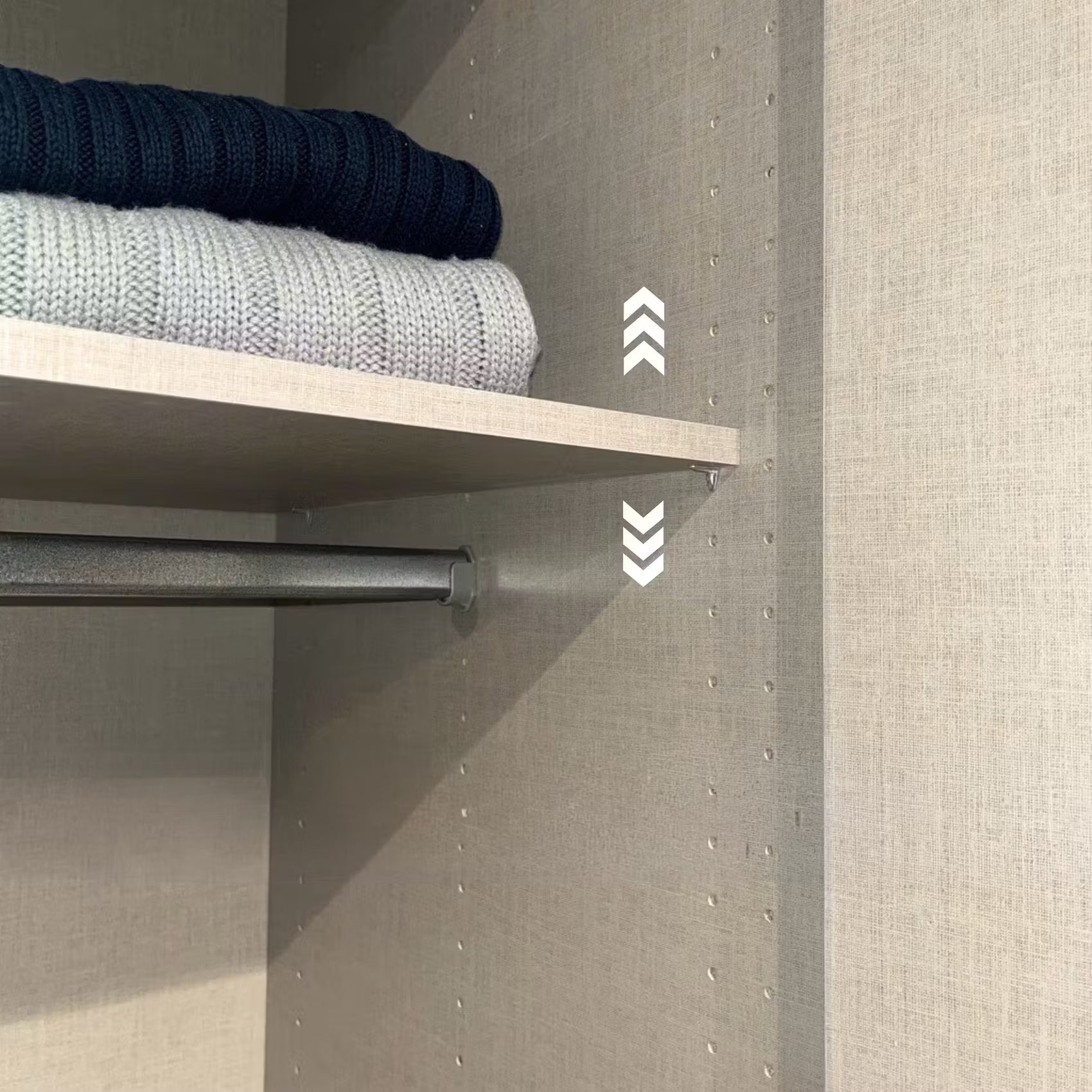 Close-up of a closet organiser interior of Rauch Atlantic Oak 3 Door Wardrobe with Grey Mirror
