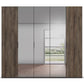 A modern Five-door Hinged Rauch Atlantic Oak and Graphite wardrobe with dark brown wood grain textured side panels and frosted glass centre doors, shown against a white background.