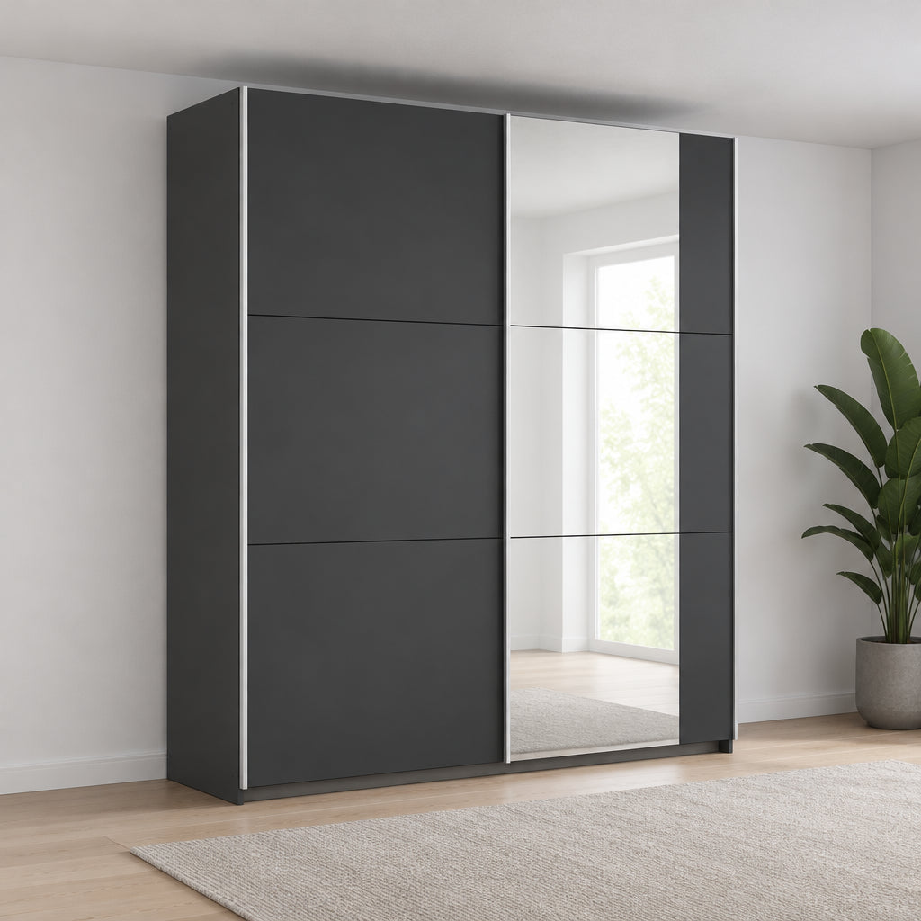 A modern Rauch Aura two-door wardrobe or storage cabinet with two dark gray matte doors,One door has mirrored pads, shown on a plain white background.