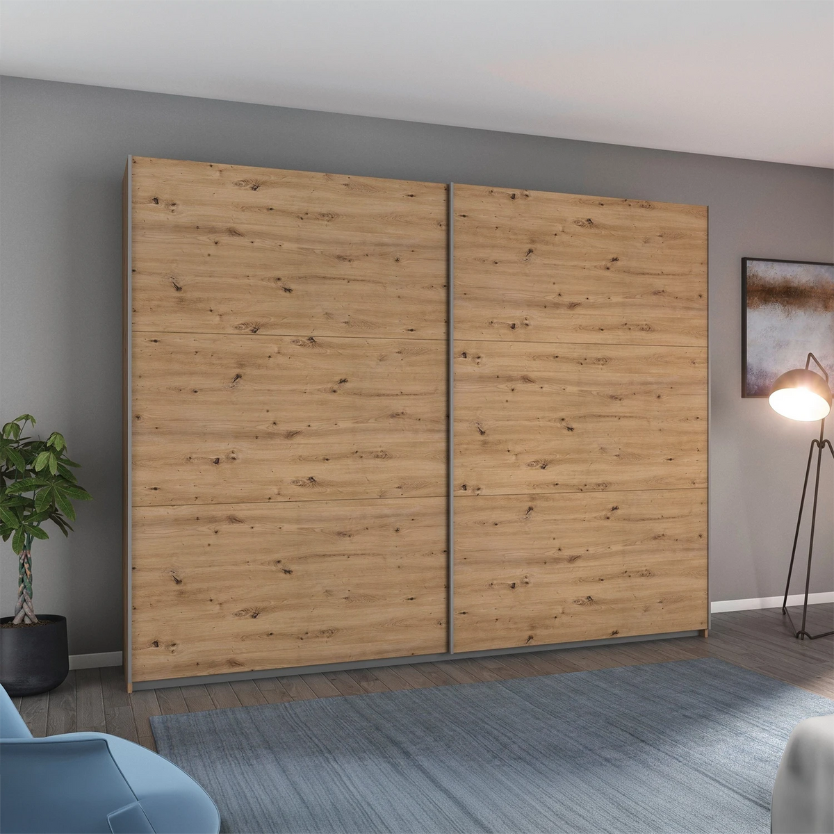 Rauch Aurelia Artisan Oak Sliding Door Wardrobe styled in a beautiful room