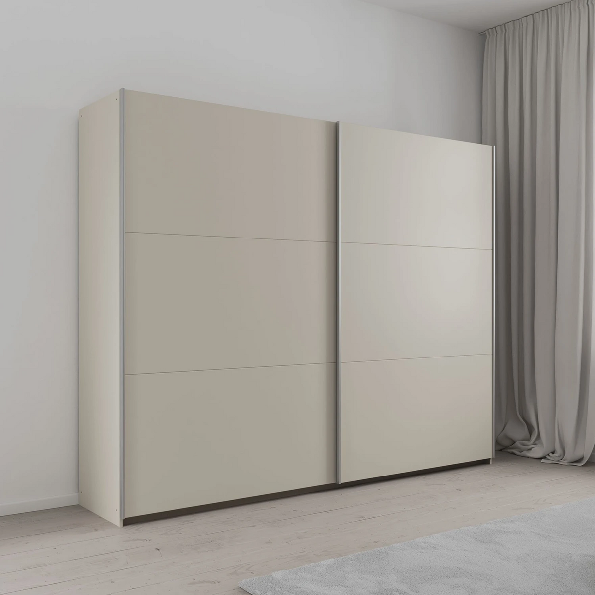 Rauch Aurelia Champagne Sliding Door Wardrobe styled in a modern bedroom