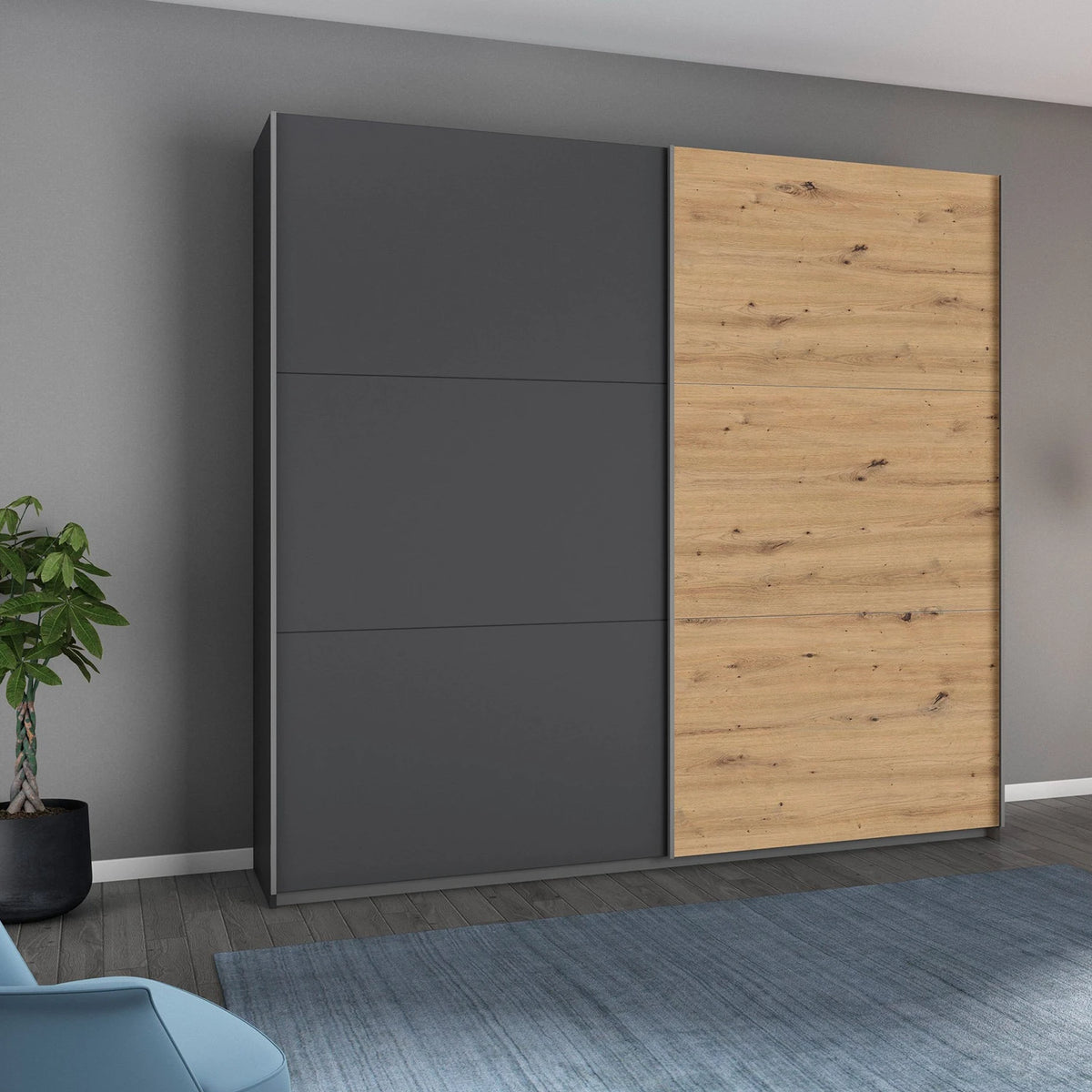 Rauch Aurelia Metallic Grey & Artisan Oak Sliding Door Wardrobe styled in a modern bedroom