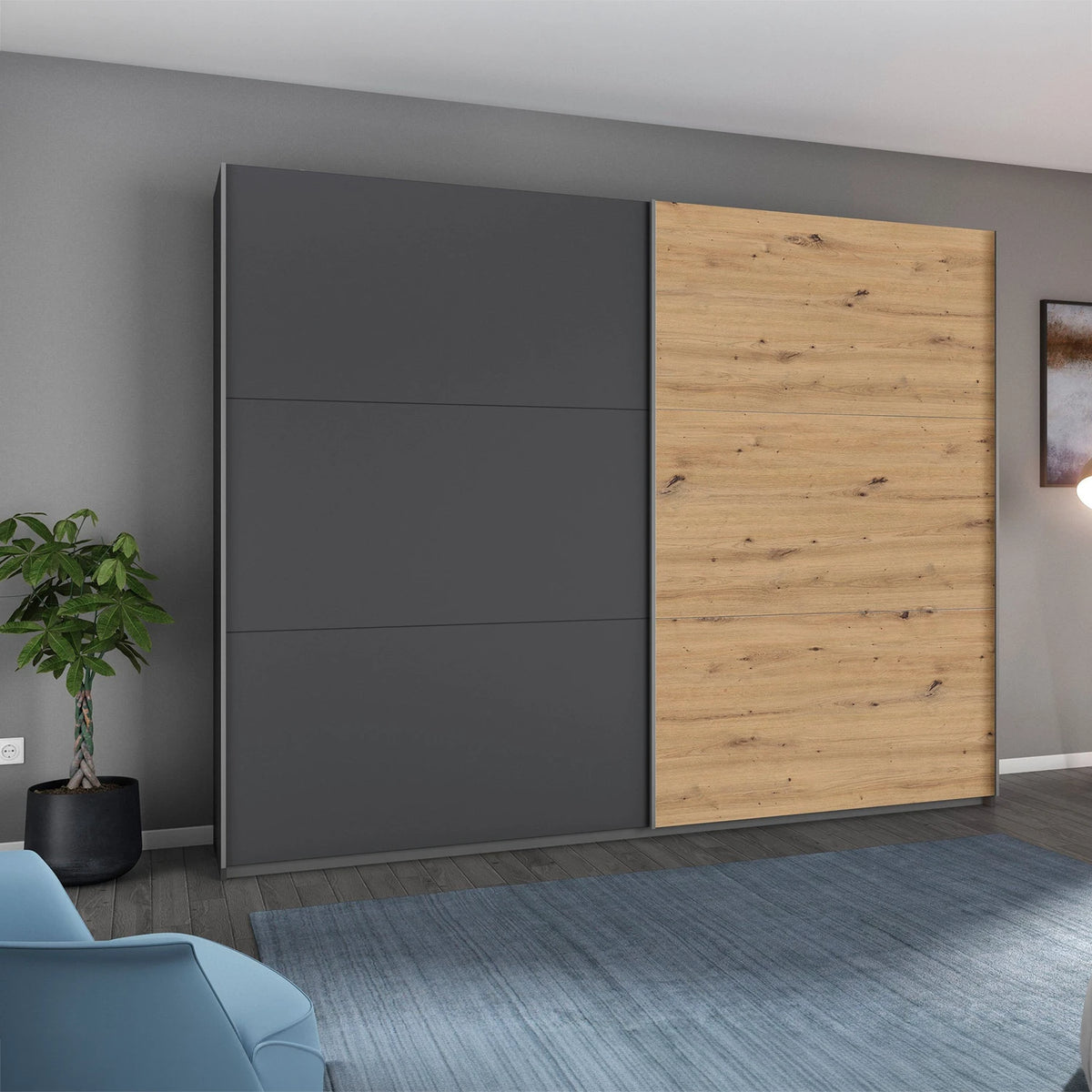 Rauch Aurelia Metallic Grey & Artisan Oak Sliding Door Wardrobe styled in a beautiful room