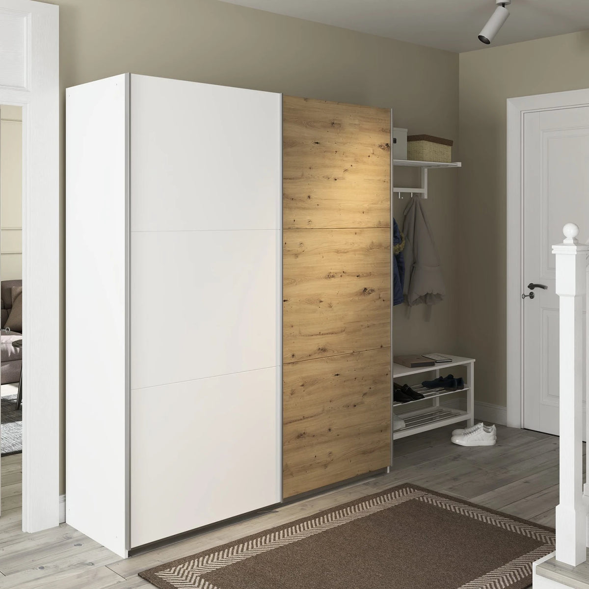 Rauch Aurelia White & Artisan Oak Sliding Door Wardrobe styled in a modern bedroom